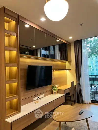 Modern living room with wall-mounted TV and stylish wooden decor