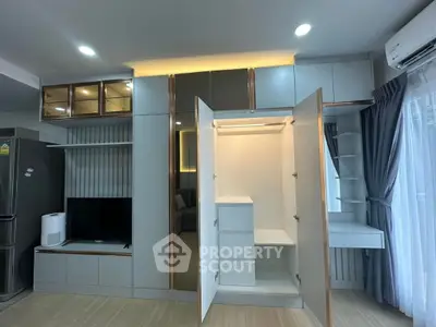 Modern living room with built-in storage and sleek design