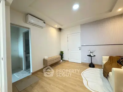 Modern living room with wooden flooring and stylish decor
