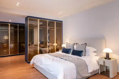 Luxurious bedroom with elegant decor and spacious wardrobe