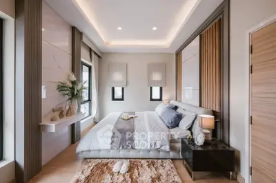 Luxurious modern bedroom with elegant decor and ambient lighting