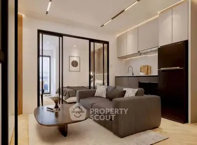 Modern living room with sleek kitchen and cozy bedroom view.