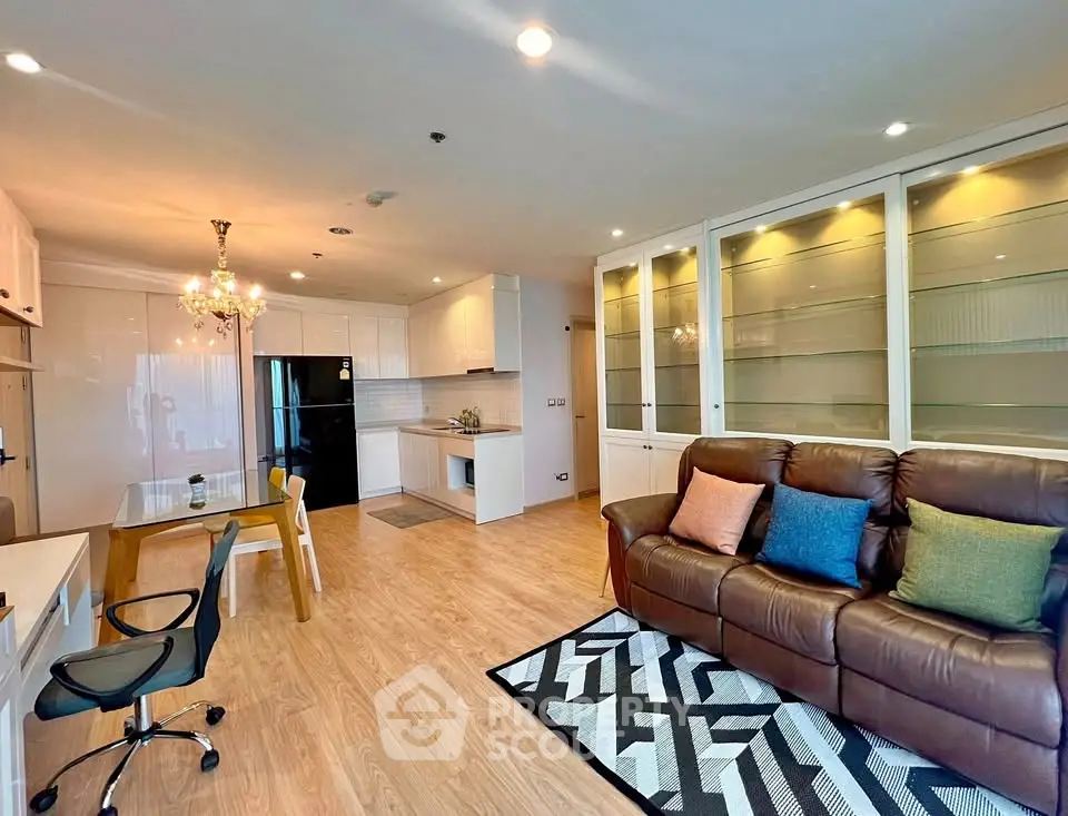 Spacious modern living room with open kitchen and elegant decor