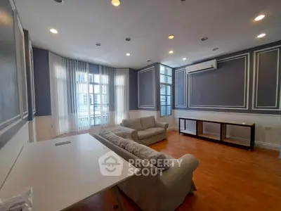 Spacious living room with elegant design and natural light