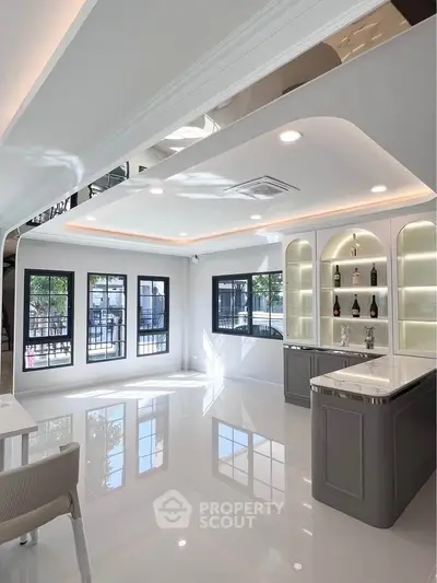 Luxurious modern living room with sleek design and ample natural light