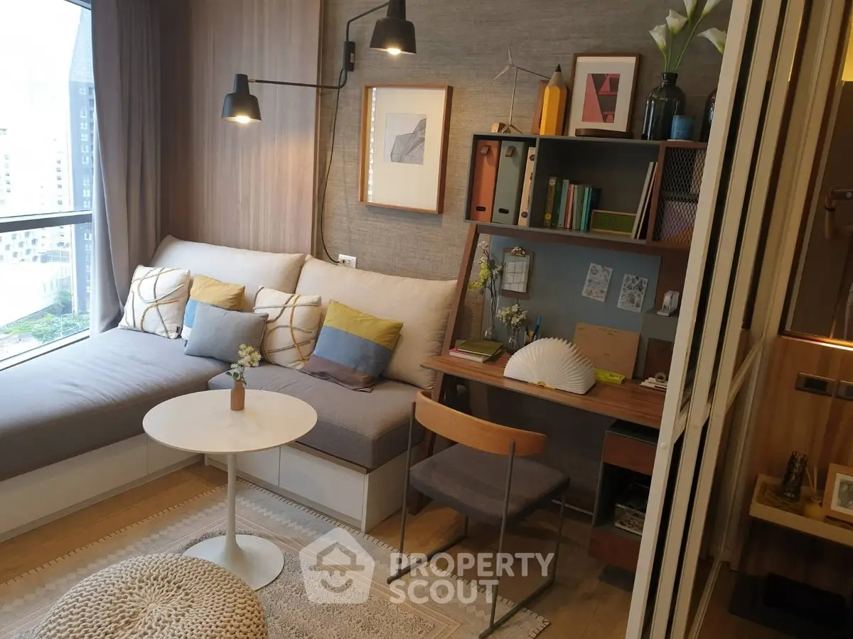 Chic living room with cozy seating and stylish decor in modern apartment