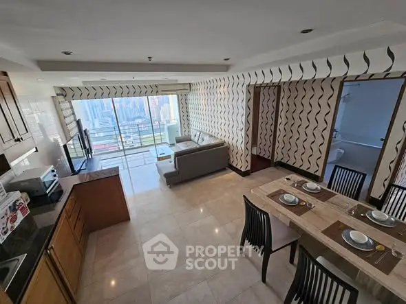 Spacious open-plan living room with city view, modern kitchen, and elegant dining area in high-rise apartment.