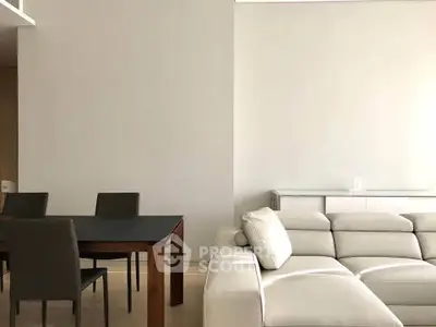 Modern living room with sleek furniture and minimalist design