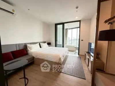 Modern bedroom with city view and stylish decor