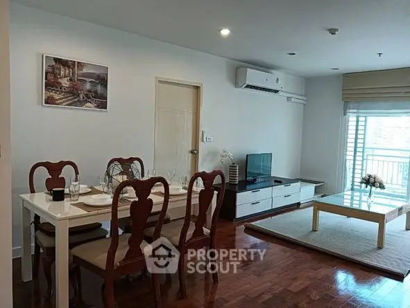 Spacious living room with elegant dining area and modern decor