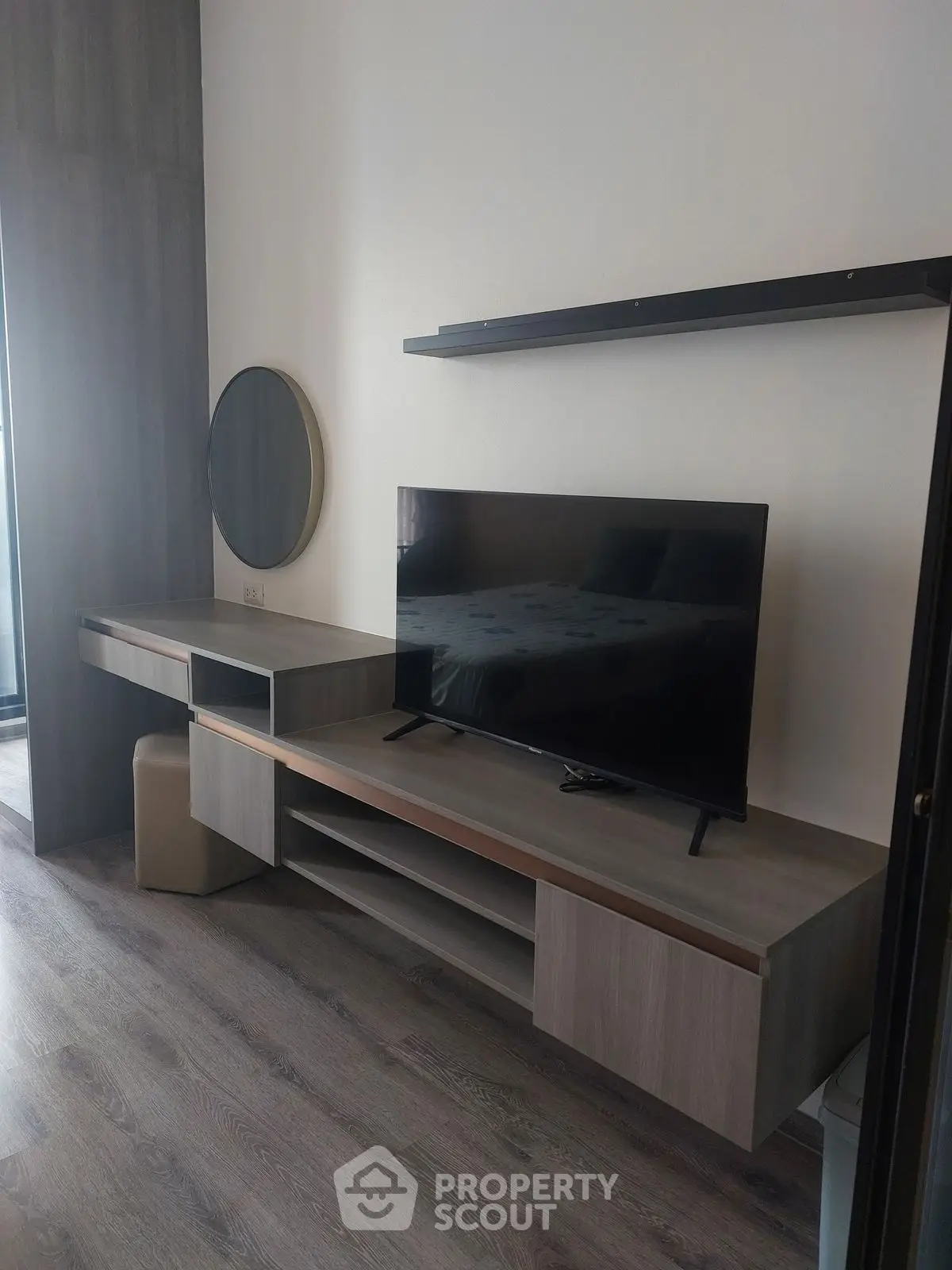 Modern living room with sleek TV stand and stylish decor