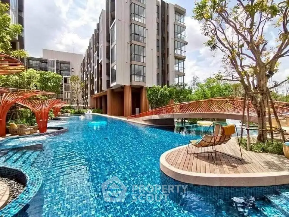 Luxurious condominium with stunning pool and modern architecture