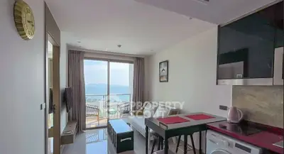 Modern living room with open kitchen and stunning balcony view