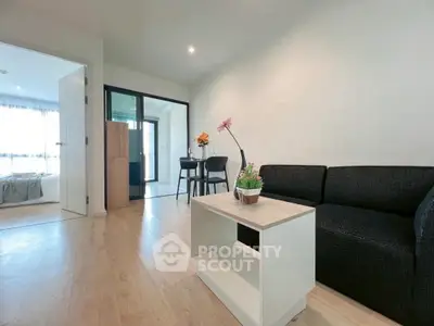 Modern living room with sleek furniture and open layout