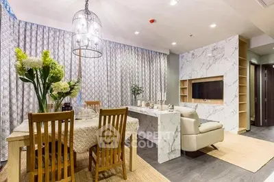 Elegant living room with marble accents and dining area, featuring modern decor and ambient lighting.
