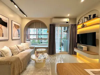 Modern living room with stylish decor and large window view