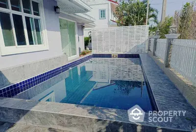 Charming residential property with a sleek private pool and modern design.