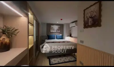 Cozy modern bedroom with stylish decor and ambient lighting