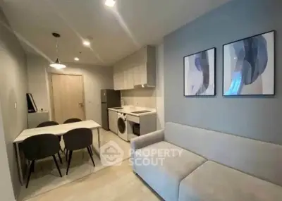 Modern living room with integrated kitchen and stylish decor