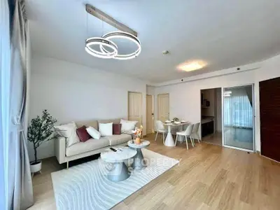 Spacious modern living room with elegant decor and natural light