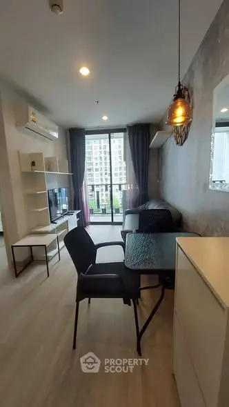 Modern living room with balcony view in stylish apartment