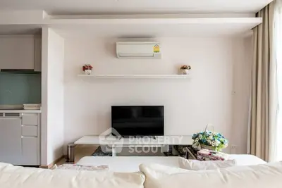 Modern living room with air conditioning and stylish decor in a cozy apartment.