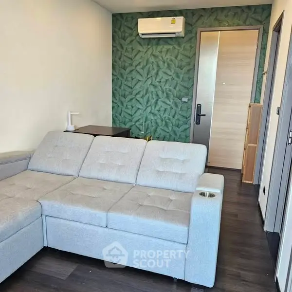 Modern living room with stylish sofa and air conditioning