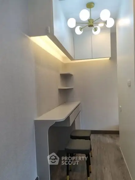 Modern study nook with sleek desk and stylish lighting