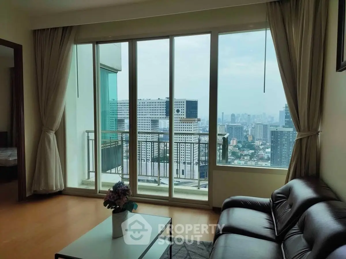 Spacious living room with stunning city view and modern decor