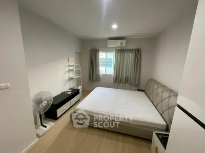 Modern bedroom with minimalist design and natural light