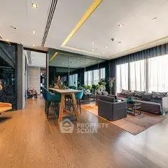 Luxurious modern living room with elegant decor and ample natural light