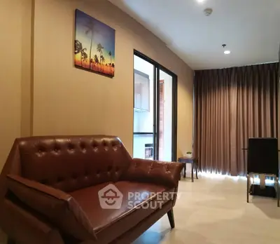 Modern living room with stylish brown leather sofa and elegant decor