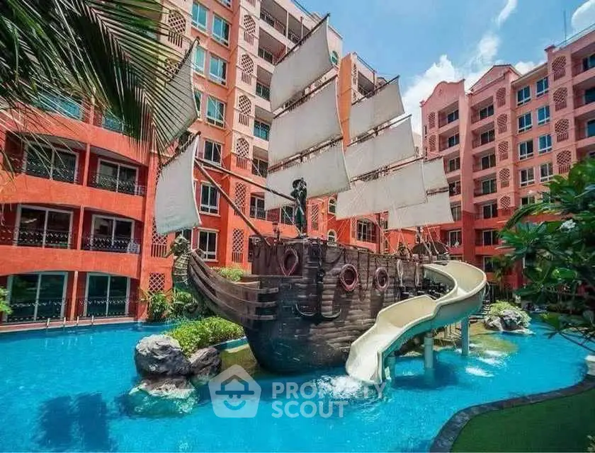 Unique apartment complex with pirate ship pool feature and vibrant architecture.