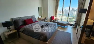 Luxurious bedroom with stunning city view and modern furnishings
