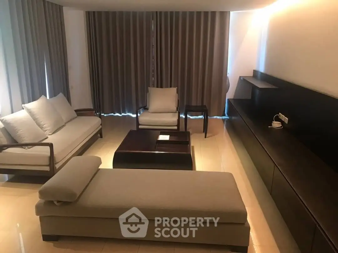 Elegant modern living room with stylish furniture and ambient lighting