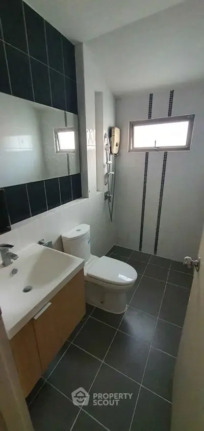 Modern bathroom with sleek fixtures and stylish tile design