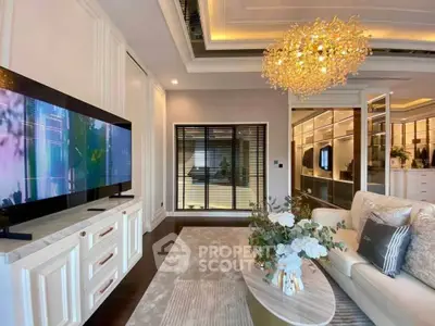 Luxurious living room with elegant chandelier and modern decor