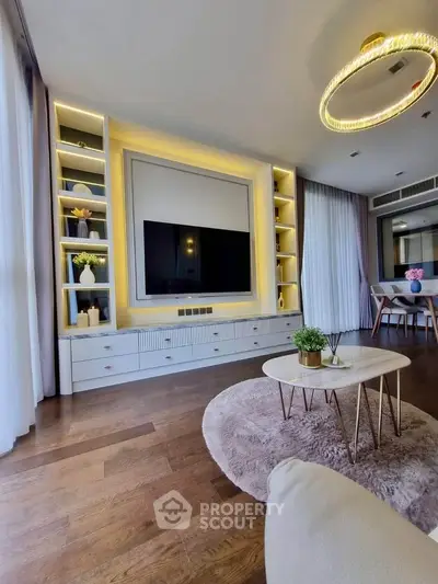 Luxurious living room with modern decor, elegant lighting, and stylish shelving, perfect for contemporary living.