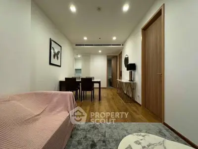 Modern living room with elegant dining area and stylish decor