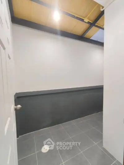 Spacious storage area with modern design and ample lighting, perfect for organizing belongings efficiently.