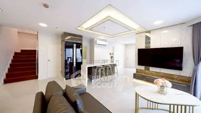 Luxurious modern living room with elegant marble accents and open layout