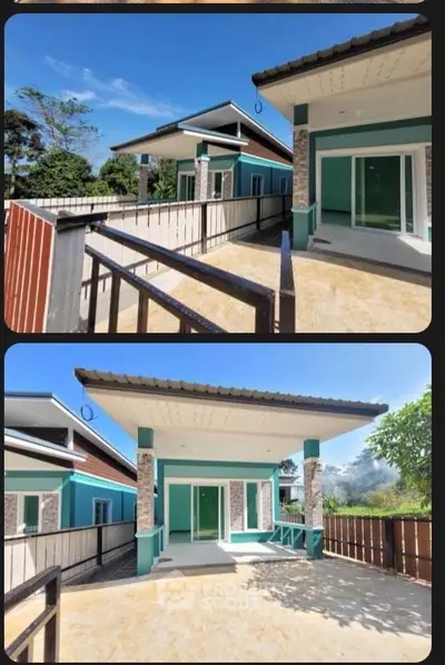 Modern single-story house with spacious balcony and lush surroundings.