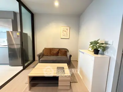 Modern living room with cozy sofa, sleek coffee table, and stylish decor in a contemporary apartment.