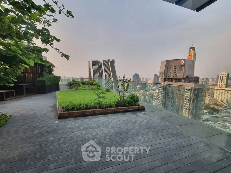 Stunning rooftop garden with panoramic city views and modern design.