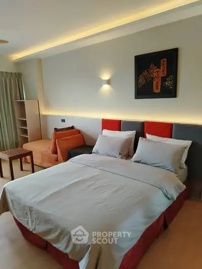 Cozy bedroom with modern decor and ambient lighting