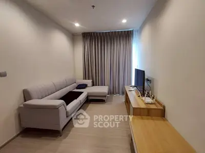 Modern living room with sleek furniture and cozy ambiance