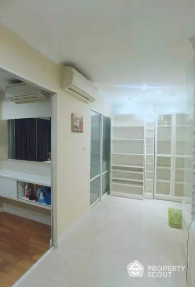 Spacious modern storage room with sleek shelving and elegant lighting