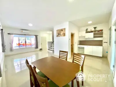 Spacious modern dining area with open layout and natural light