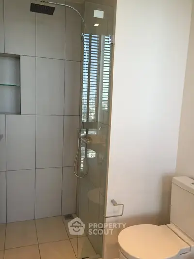 Modern bathroom with glass shower and sleek design