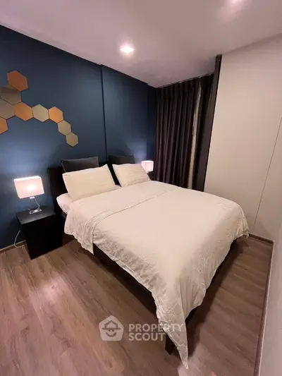 Cozy modern bedroom with stylish decor and ambient lighting